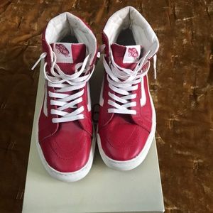 Red leather high top vans
